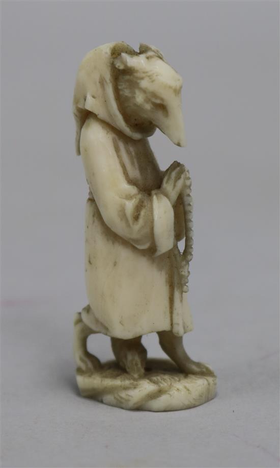 A Dieppe ivory carving of a hound as a pilgrim, c.1880